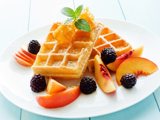 Belgium waffles with fruits and honey