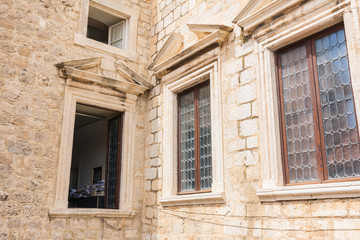 Fototapeta na wymiar Architectural Detail Old European Fortress Windows Medieval Dubrovnik Croatia Open Office