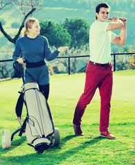 Obraz premium Golf partners playing together