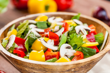 vegetable salad bowl on kitchen table, balanced diet