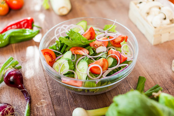 vegetable salad bowl on kitchen table, balanced diet