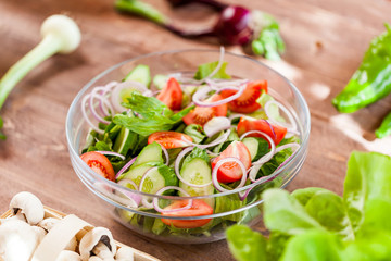 vegetable salad bowl on kitchen table, balanced diet