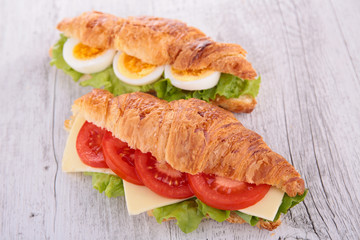 croissant with cheese,tomato and egg