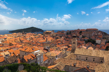 Fototapeta premium Famous Orange Rooftops of Dubrovnik Croatia Cityscape Aerial View Walking Along Fortress Walls