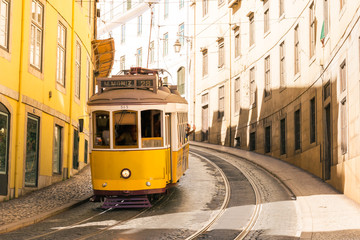 Fototapeta na wymiar Famous Trolly Carriage on Street in Lisbon Portugal Historic Transportation Attraction