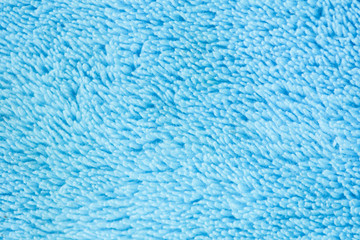 Fototapeta na wymiar Closeup of soft blue fabric