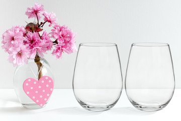 Mockup - stemless wine glasses, blossom in a vase, perfect for businesses who sell decals and stickers, just overlay your designs