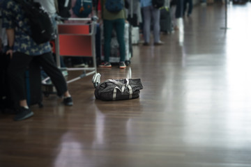 Fototapeta na wymiar A Travel bag on tile floor