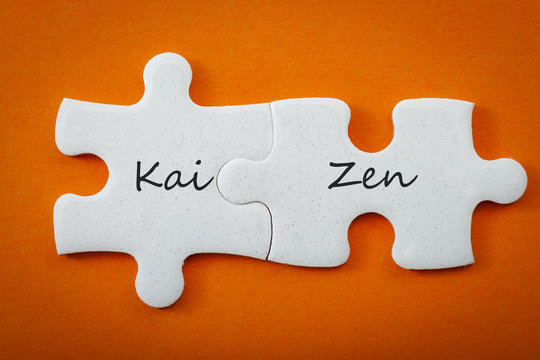 Business concept and interconnected puzzle pieces that put the words &ldquo;kai&rdquo; meaning "continuous" and &ldquo;zen&rdquo; meaning "improvement" or "wisdom". Kaizen is the Japanese strategy for "continual improvement"
