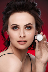 Eye Cream. Beautiful Woman With Cream On Skin Under Eyes