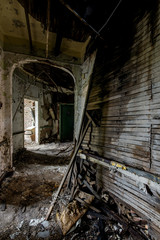 Fototapeta na wymiar Curved Hallway - Abandoned Hospital & Nursing Home