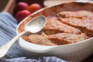 Cobbler with fruit filling, rustic style, selective focus
