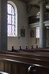 german catholic church with religious details around altar and architecture