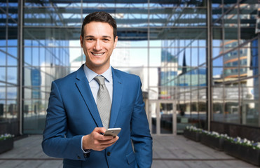 Businessman using his mobile phone