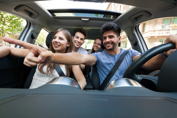 Group of friends on a car