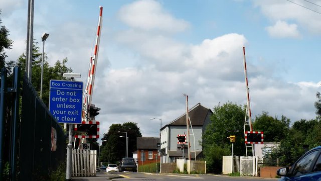 BLYTHE BRIDGE, STAFFORDSHIRE - 21ST AUGUST 2017: cars driving over railway crossing