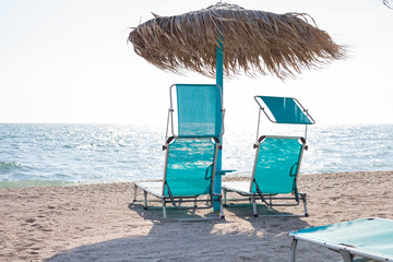 Sunbeds and umbrellas on the romanian seaside