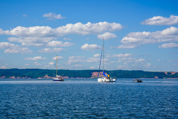Three Boats on the River.