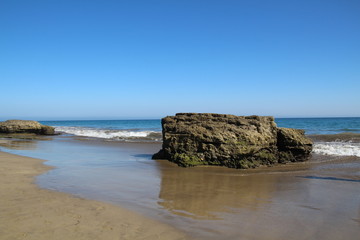 Ein Fels in der Brandung