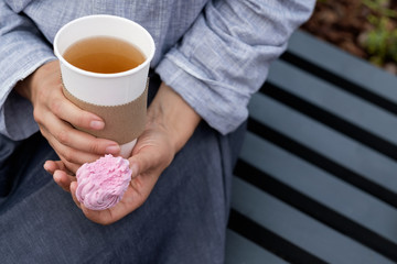 Girl preparing tea outdoor. Have breakfast outdoor in the morning