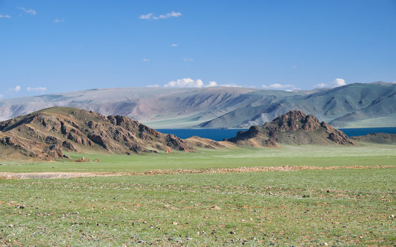 Mongolian natural landscapes near lake Tolbo-Nuur surrounded by mountains and rocks  in north Mongolia