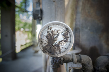 Broken temperature meter in smelting plant.