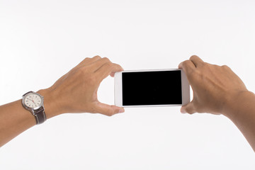 Isolated image of hands holding mobile phone and taking photo on white background