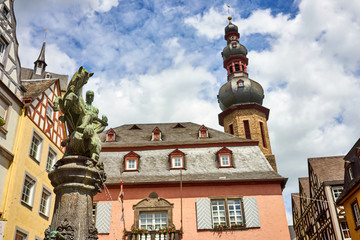 Fototapeta premium Statue and church of Saint Martin / Central place of Cochem City in Germany