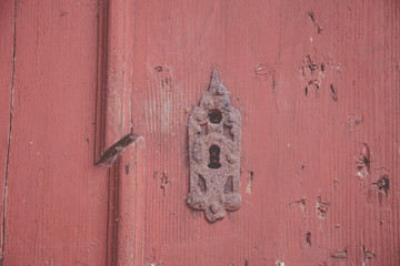 Old germany lock on red door,