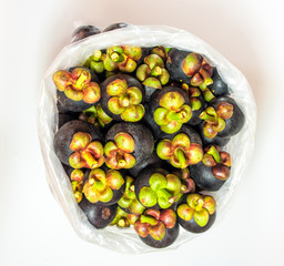 Fresh mangosteen in the big plastic bags for wholesale