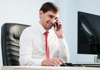 Young businessman communicating with client