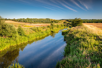 River Aln below Hawkhill Bridge / As the River Aln approaches the North Sea at Alnmouth, it meanders through farmland.