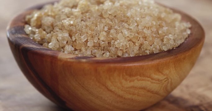 brown suger in wood bowl