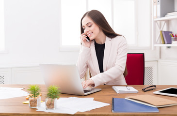 Business talk, woman consulting by phone at office