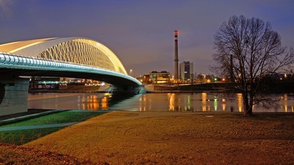 Troya bridde in Prag over the Vlatava river in the night with illumination
