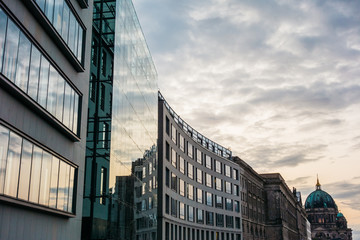 beautiful office buildings in a row with berlin dom at the end © Novanture