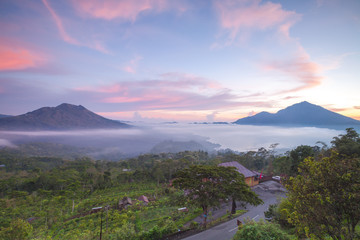 Kintamani volcano and Lake Batur in the morning, viewed from Penelokan are a popular sightseeing destination in Bali's central highlands, Indonesia.