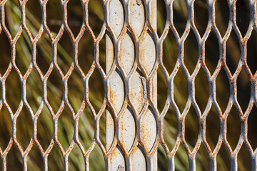 Old metal grid abstract texture, selective focus