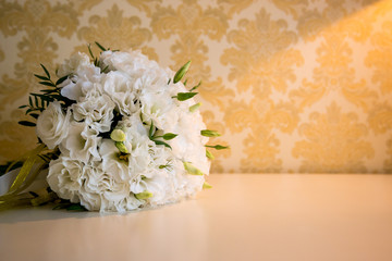 White wedding bride bouquet on the table