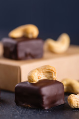 Handmade chocolate bonbons with cashew