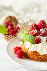 Raspberry Cake with whipped cream on pink background