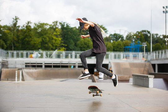 Skater jumping in skate park