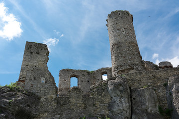 Fototapeta na wymiar Photography of Ruins Ogrodzieniec Castle at sunny summer day. Poland Ogrodzieniec city