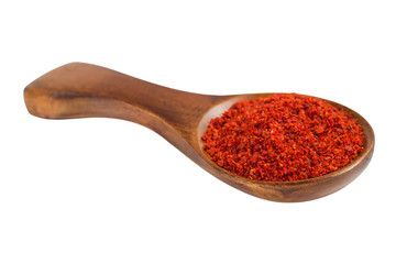 Red paprika pepper in a wooden spoon