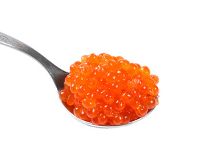Red caviar isolated on a white background. Macro.