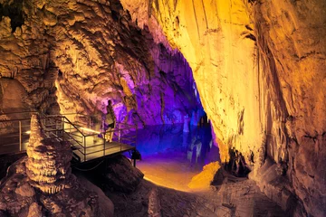 Fototapete People admire the beauty of underground lake in Dim cave. Valley of Dim river, Alanya, Turkey © O'SHI