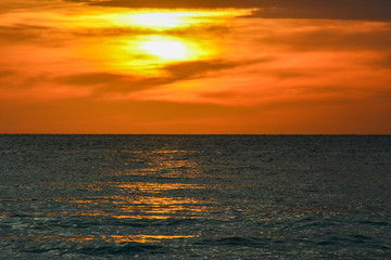 Colors at sunset in the ocean with wooden boats in the sea of the tropical island of Boracay in the Philippines