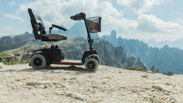 Fototapeta Mobile electric buggies on the mountain, Dolomites, Italy. disable car