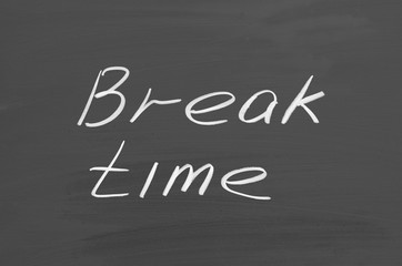 Break time. Text on chalkboard