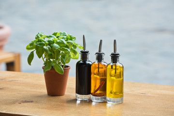 Cafe table with herbs and condiments